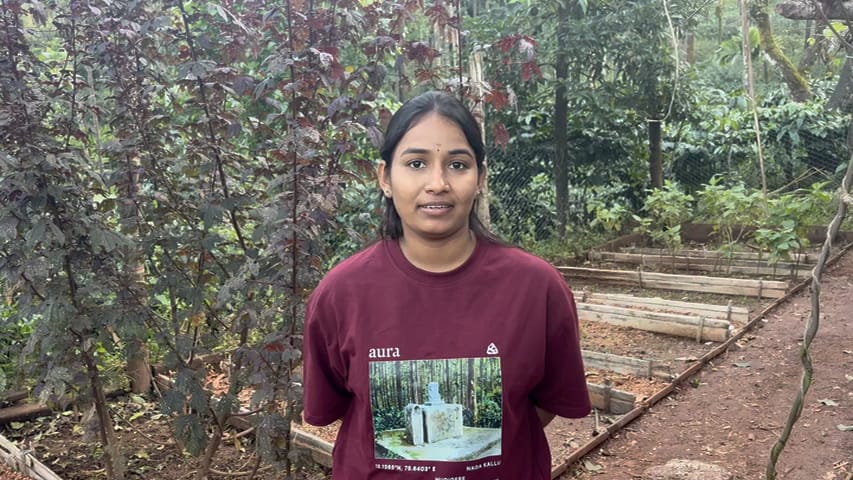 Nayana in an Aura T-shirt, talking about tagging the estate’s trees