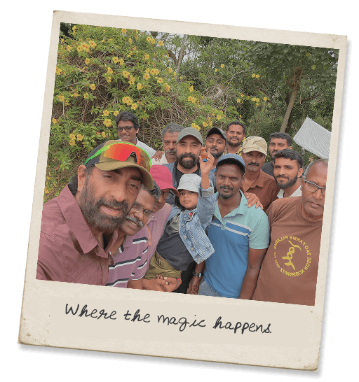 A polaroid of the estate crew — captioned “Where the magic happens.”